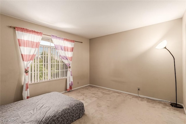 8041 Astrology Ct Unit 201, Las Vegas, NV 89128 - carpeted bedroom featuring baseboards