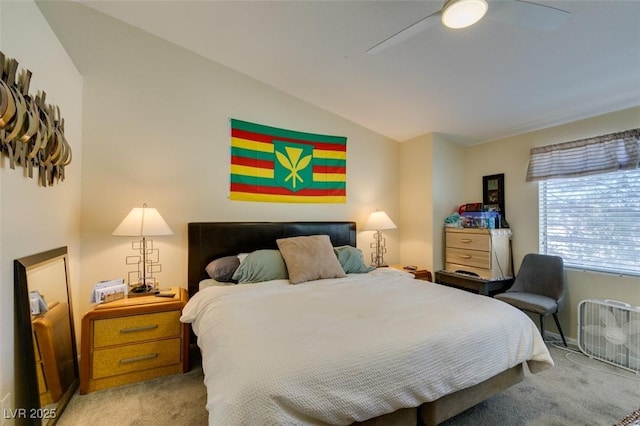 5415 W Harmon Ave Unit 2075, Las Vegas, NV 89103 - bedroom featuring light colored carpet, lofted ceiling, and ceiling fan