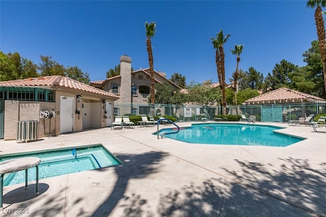 5415 W Harmon Ave Unit 2075, Las Vegas, NV 89103 - community pool featuring a patio area