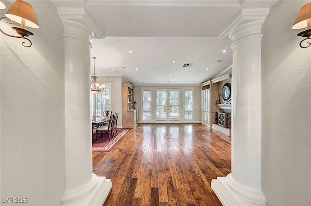 5224 Painted Lakes Way, Las Vegas, NV 89149 - living room featuring ornate columns, ornamental molding, hardwood / wood-style flooring, and recessed lighting