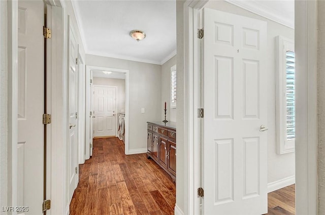 5224 Painted Lakes Way, Las Vegas, NV 89149 - hall featuring dark wood-style floors, crown molding, and washer / clothes dryer