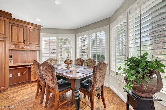 5224 Painted Lakes Way, Las Vegas, NV 89149 - dining area featuring plenty of natural light, light wood-style flooring, and recessed lighting