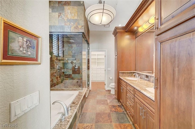 5224 Painted Lakes Way, Las Vegas, NV 89149 - bathroom with double vanity, stone finish flooring, a garden tub, a shower stall, and a textured wall
