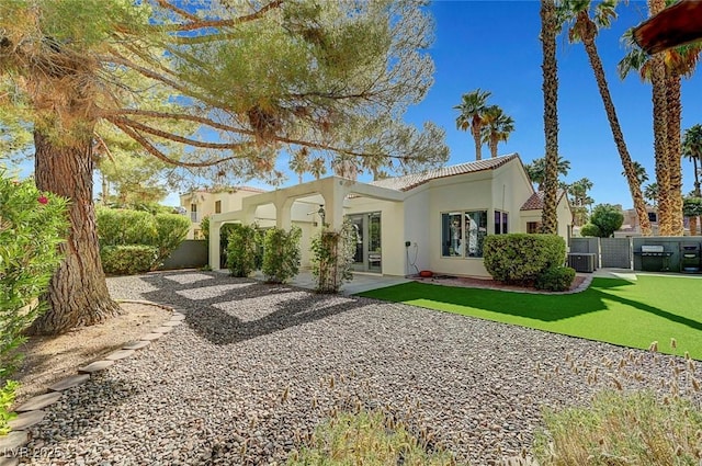 5224 Painted Lakes Way, Las Vegas, NV 89149 - rear view of property with stucco siding, a patio area, and a tile roof