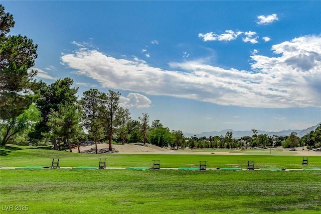 5224 Painted Lakes Way, Las Vegas, NV 89149 - view of community featuring a mountain view, a yard, and view of golf course