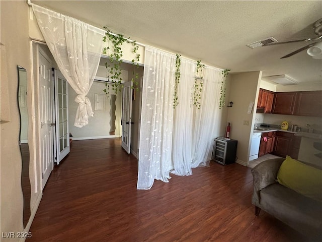 5499 Indian River Dr Unit 356, Las Vegas, NV 89103 - interior space with dark wood-style floors, a textured ceiling, and ceiling fan