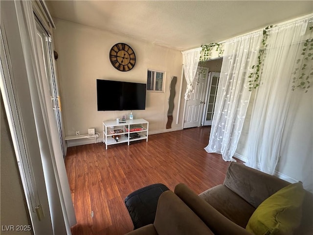 5499 Indian River Dr Unit 356, Las Vegas, NV 89103 - living room featuring wood finished floors and baseboards
