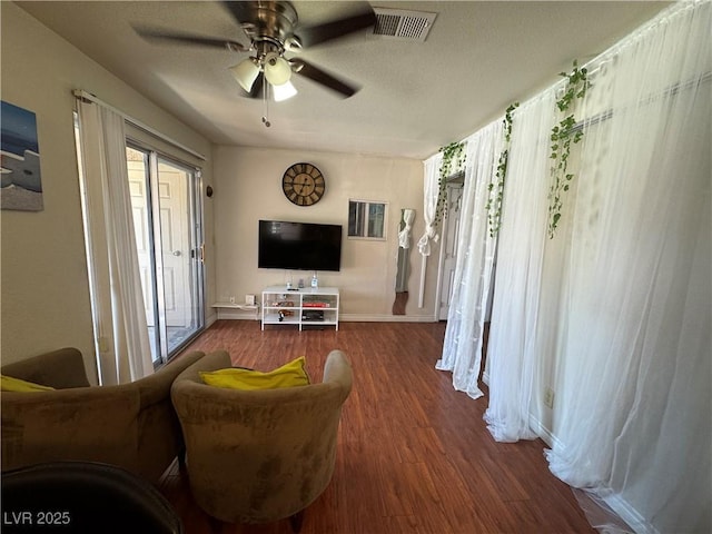 5499 Indian River Dr Unit 356, Las Vegas, NV 89103 - living area with wood finished floors and ceiling fan