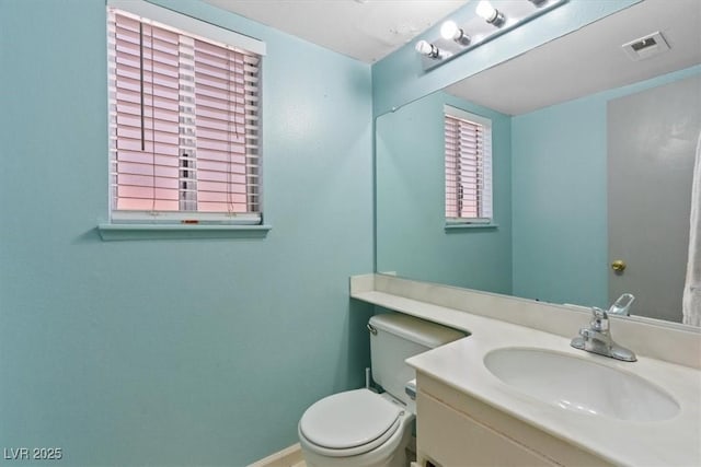 1711 Ember Glow Cir, Las Vegas, NV 89119 - half bath featuring vanity and toilet