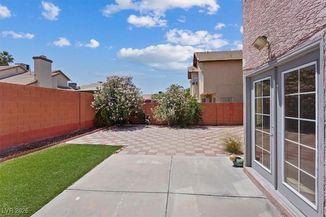 1711 Ember Glow Cir, Las Vegas, NV 89119 - fenced backyard featuring a patio area