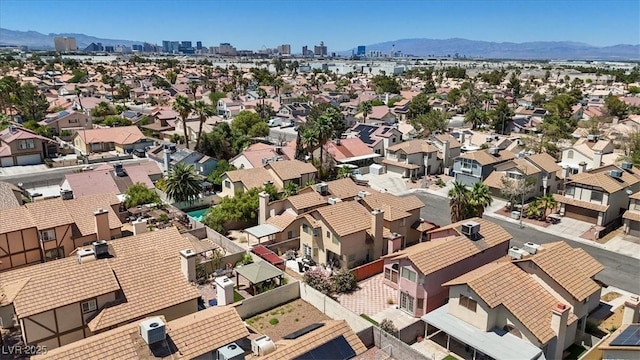 1711 Ember Glow Cir, Las Vegas, NV 89119 - aerial perspective of suburban area featuring a mountain backdrop