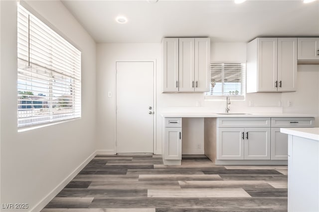 600 Berry Cir, Las Vegas, NV 89107 - kitchen with light countertops, recessed lighting, and wood finished floors