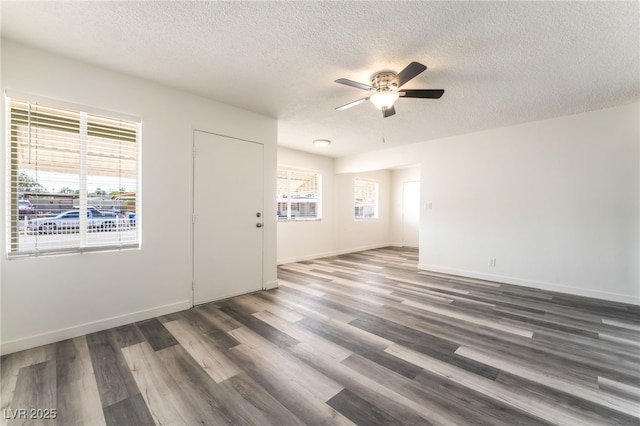 600 Berry Cir, Las Vegas, NV 89107 - spare room with a textured ceiling, ceiling fan, and wood finished floors