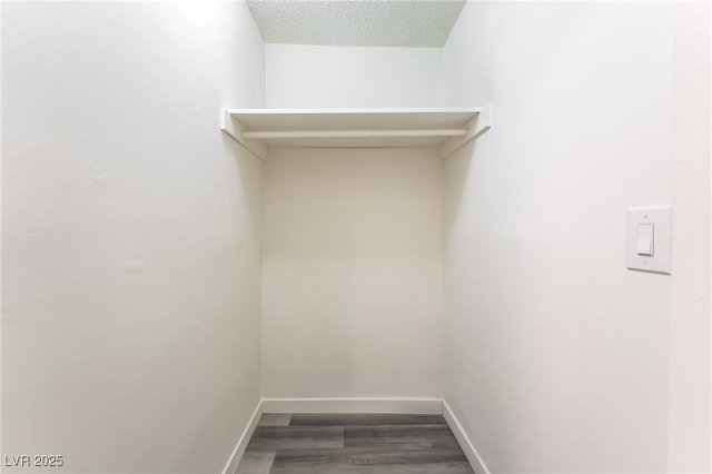 600 Berry Cir, Las Vegas, NV 89107 - walk in closet with wood finished floors