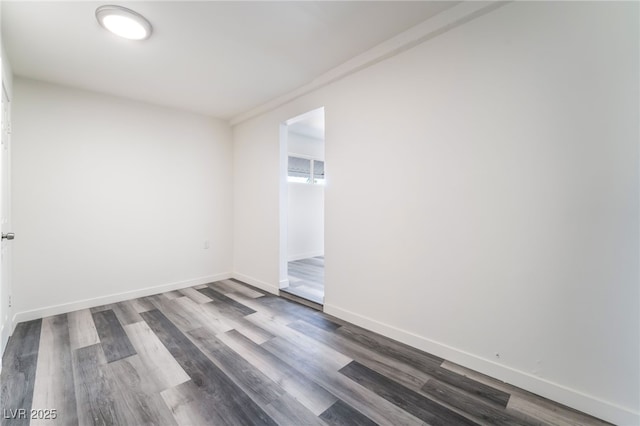 600 Berry Cir, Las Vegas, NV 89107 - spare room featuring dark wood-style flooring