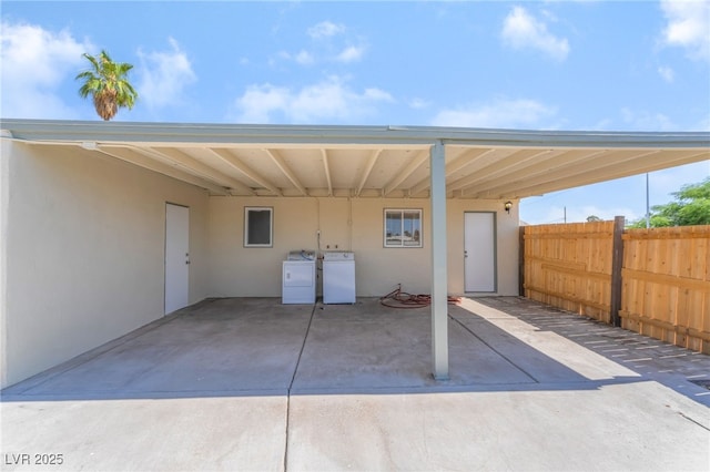 600 Berry Cir, Las Vegas, NV 89107 - view of patio featuring washer and clothes dryer and an attached carport
