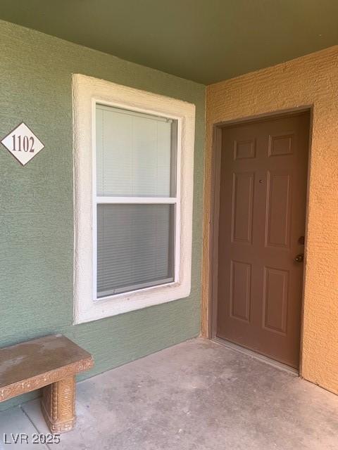 8101 W Flamingo Rd Unit 1102, Las Vegas, NV 89147 - entrance to property with stucco siding