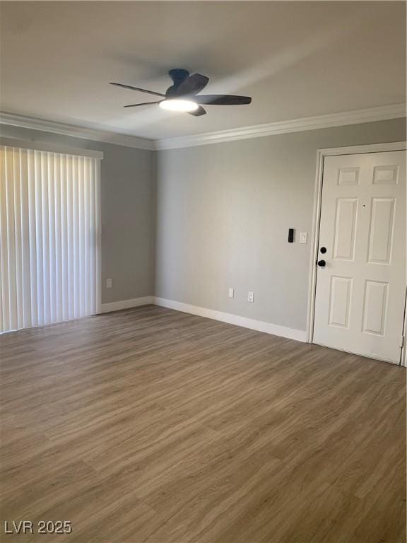 8101 W Flamingo Rd Unit 1102, Las Vegas, NV 89147 - empty room featuring a ceiling fan, wood finished floors, and crown molding