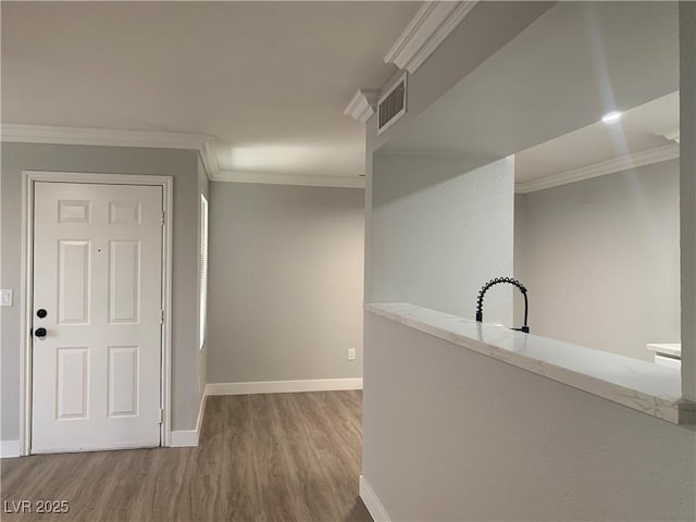 8101 W Flamingo Rd Unit 1102, Las Vegas, NV 89147 - hallway with wood finished floors and crown molding