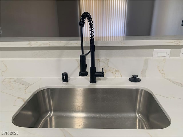8101 W Flamingo Rd Unit 1102, Las Vegas, NV 89147 - kitchen view of a sink and light stone counters