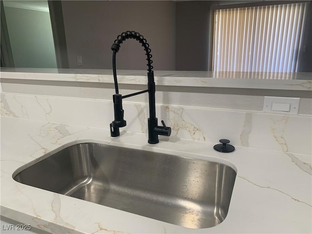 8101 W Flamingo Rd Unit 1102, Las Vegas, NV 89147 - kitchen view of tasteful backsplash and light stone countertops