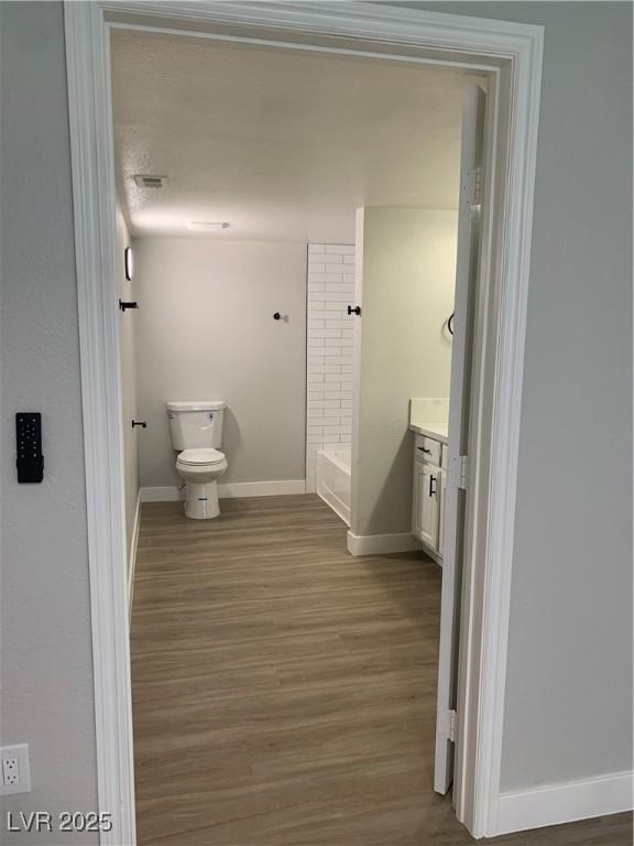 8101 W Flamingo Rd Unit 1102, Las Vegas, NV 89147 - full bath with vanity and wood finished floors