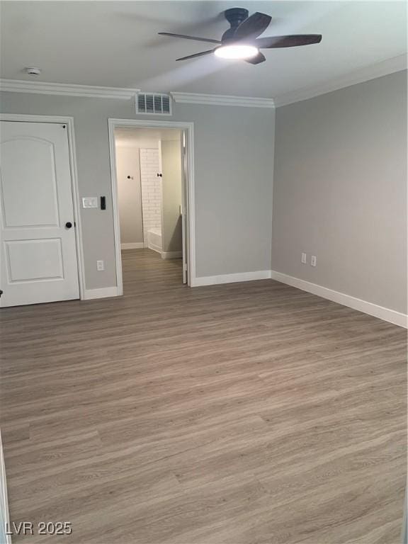 8101 W Flamingo Rd Unit 1102, Las Vegas, NV 89147 - unfurnished room with ceiling fan, light wood-type flooring, and ornamental molding
