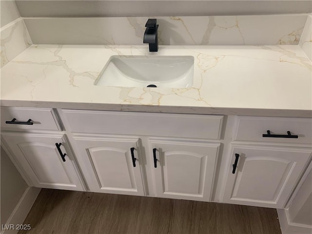 8101 W Flamingo Rd Unit 1102, Las Vegas, NV 89147 - bathroom view of vanity and wood finished floors