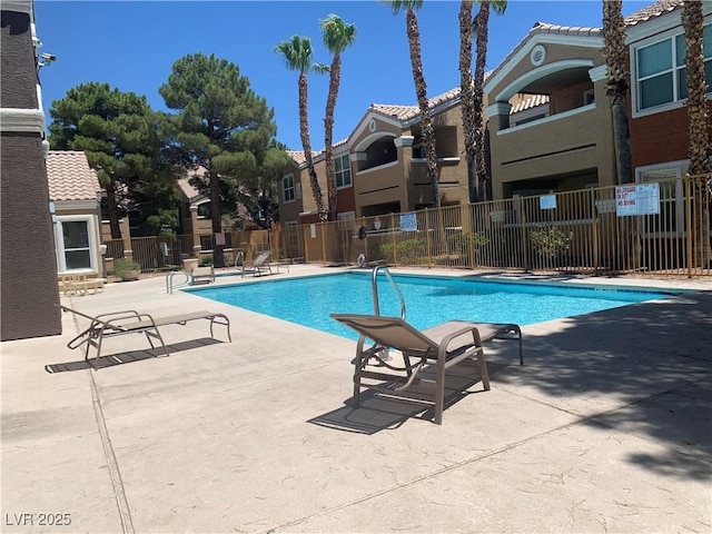 8101 W Flamingo Rd Unit 1102, Las Vegas, NV 89147 - community pool with a patio area