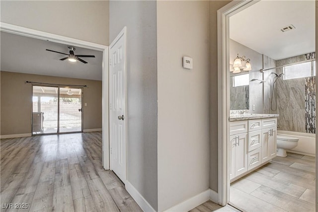 8517 Soneto Ln, Las Vegas, NV 89117 - corridor with light wood-style flooring