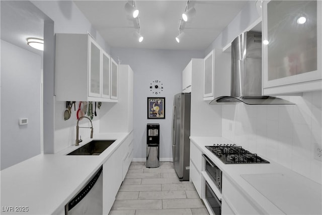 2305 W Horizon Ridge Parkway Unit 611, Henderson, NV 89052 - kitchen featuring stainless steel appliances, white cabinets, light countertops, island range hood, and glass insert cabinets