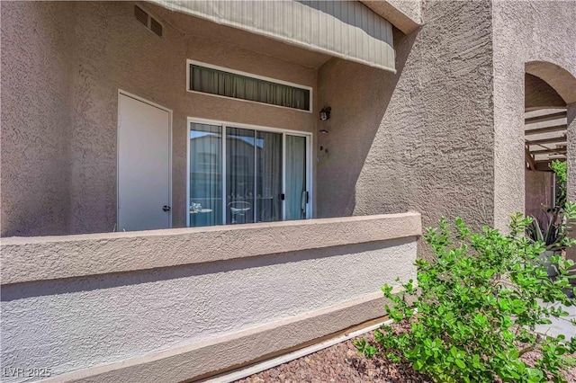 2305 W Horizon Ridge Parkway Unit 611, Henderson, NV 89052 - view of exterior entry with a balcony and stucco siding