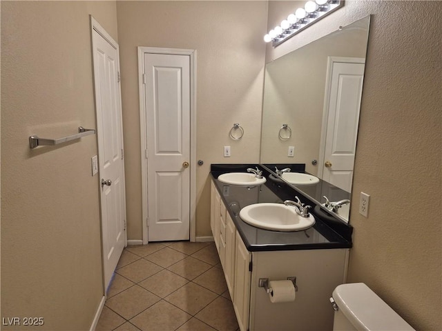 2900 Sunridge Heights Pkwy Unit 418, Henderson, NV 89052 - bathroom with tile patterned flooring and double vanity