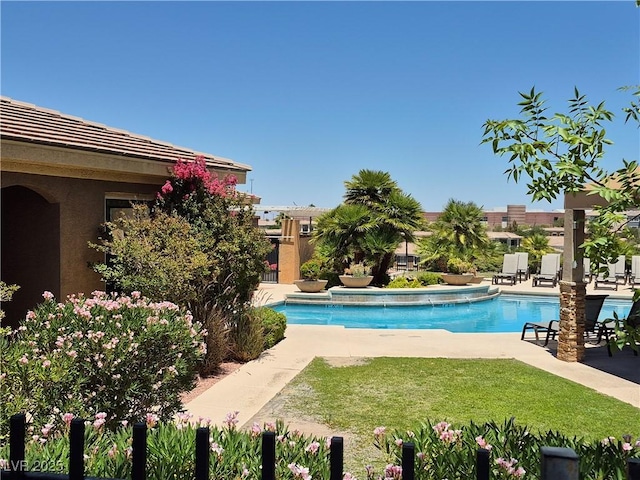 2900 Sunridge Heights Pkwy Unit 418, Henderson, NV 89052 - community pool with a lawn and a patio