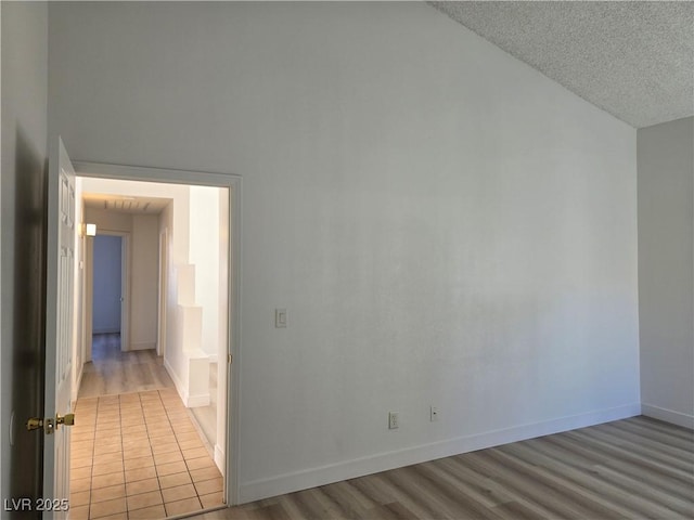 6636 Old Oxford Ave, Las Vegas, NV 89108 - spare room with wood finished floors and a textured ceiling