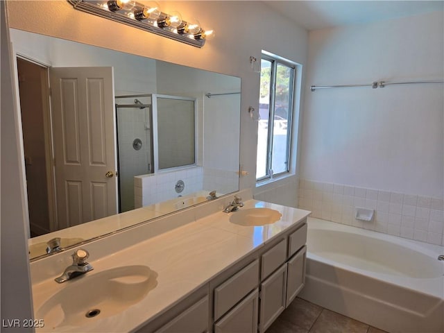 6636 Old Oxford Ave, Las Vegas, NV 89108 - full bath with tile patterned flooring, a bath, double vanity, and a shower stall