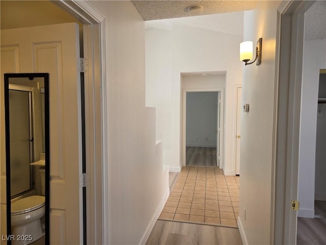 6636 Old Oxford Ave, Las Vegas, NV 89108 - hall with wood finished floors and a textured ceiling