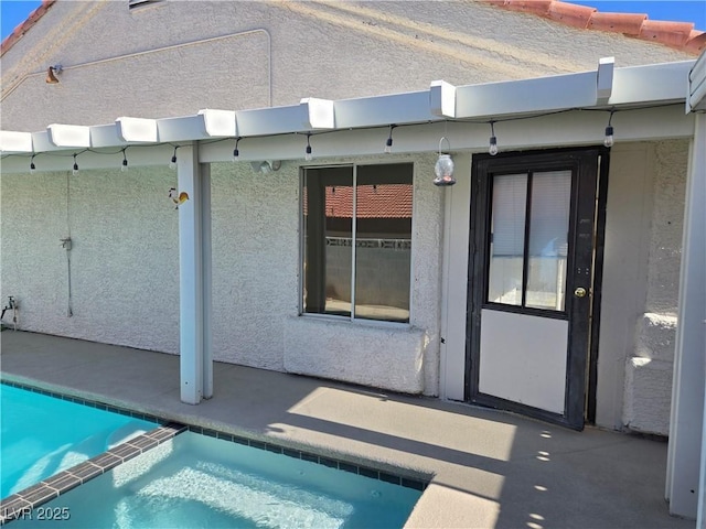 6636 Old Oxford Ave, Las Vegas, NV 89108 - back of house featuring a pool with connected hot tub and a patio