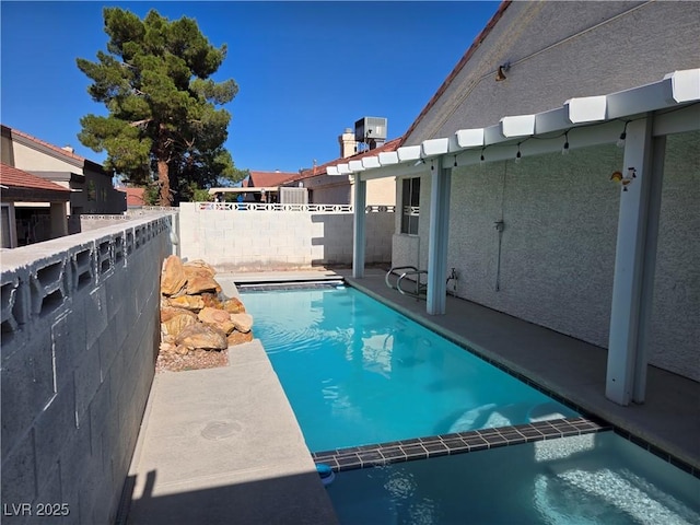 6636 Old Oxford Ave, Las Vegas, NV 89108 - view of pool featuring a fenced backyard and a pool with connected hot tub