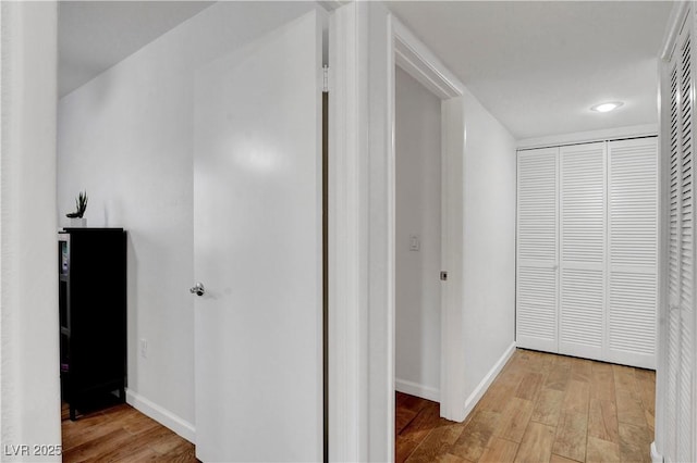 7950 W Flamingo Rd Unit 1042, Las Vegas, NV 89147 - corridor with light wood finished floors and recessed lighting