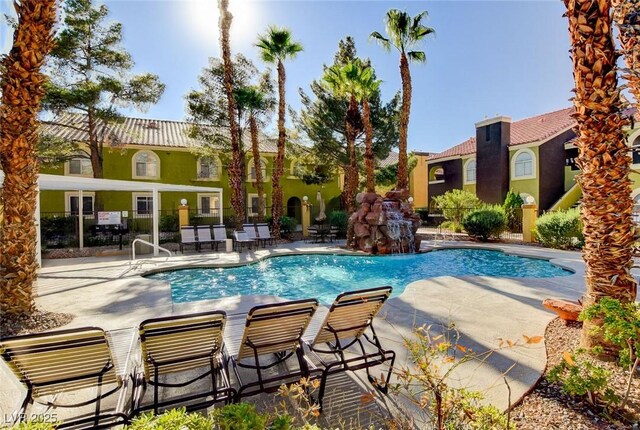 7950 W Flamingo Rd Unit 1042, Las Vegas, NV 89147 - community pool featuring a patio