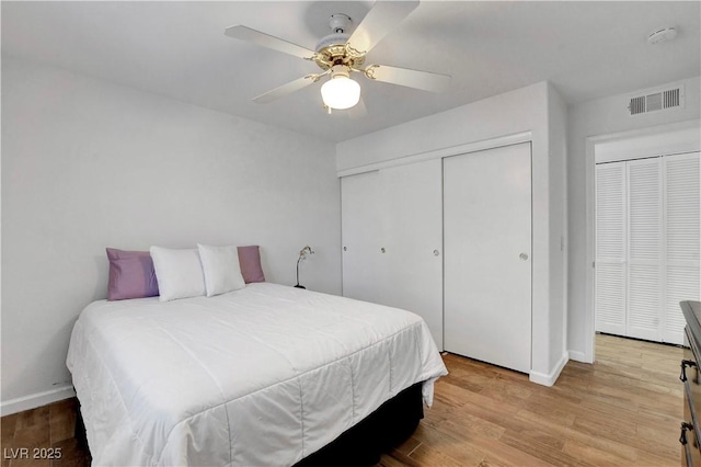 7950 W Flamingo Rd Unit 1042, Las Vegas, NV 89147 - bedroom with light wood-style floors, a closet, and a ceiling fan