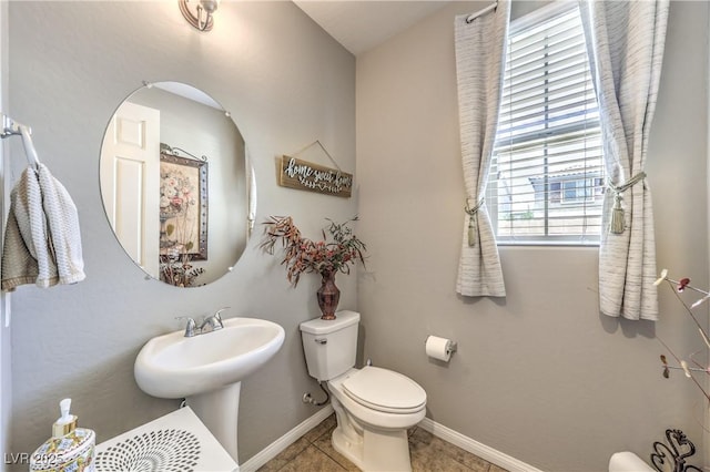 10961 Winter Rise St, Las Vegas, NV 89141 - bathroom featuring toilet and tile patterned flooring