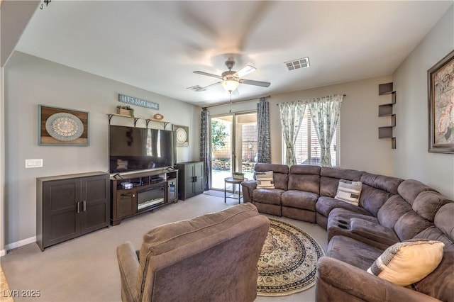 10961 Winter Rise St, Las Vegas, NV 89141 - living area with a ceiling fan and light colored carpet
