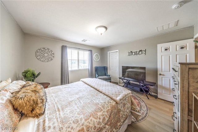 10961 Winter Rise St, Las Vegas, NV 89141 - bedroom featuring light wood-style flooring and crown molding