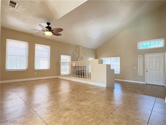 3679 Funston Way, Las Vegas, NV 89129 - unfurnished living room featuring light tile patterned floors, a ceiling fan, and high vaulted ceiling