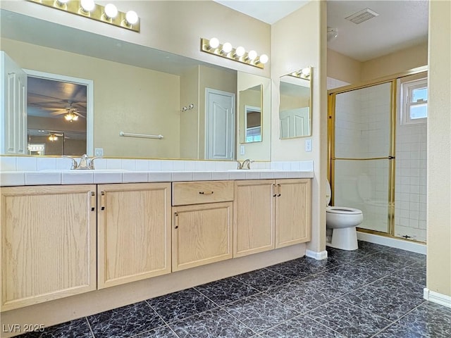 3679 Funston Way, Las Vegas, NV 89129 - full bathroom featuring double vanity, a stall shower, and ceiling fan