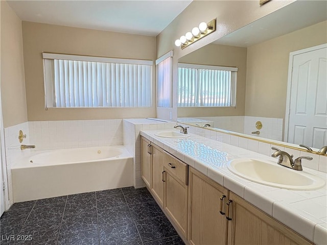 3679 Funston Way, Las Vegas, NV 89129 - full bathroom featuring double vanity and a garden tub