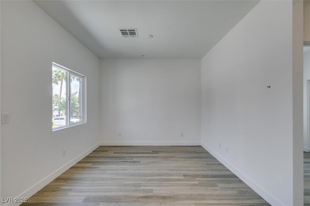 383 N 16th St, Las Vegas, NV 89101 - empty room featuring light wood-style flooring and baseboards