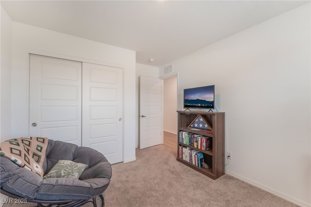 518 Descubir Ave, North Las Vegas, NV 89081 - living area featuring light carpet and baseboards
